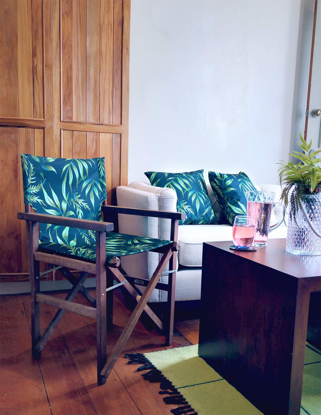 Tropical Fern Leaf print deck chair and throw pillows by Andrea Muller