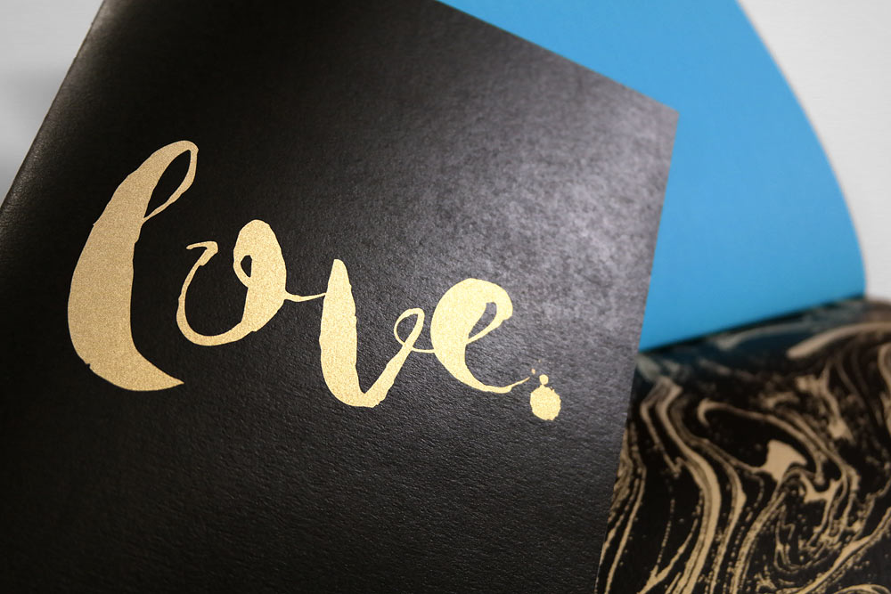 Black and gold 'love' notebook cover