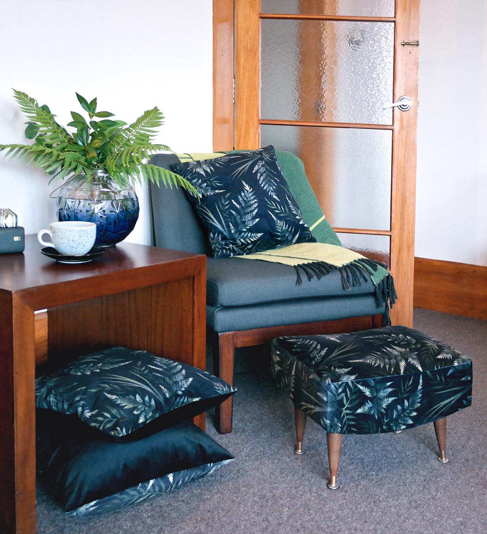 Watercolor fern leaf pattern black velvet cushions and footstool by Andrea Muller