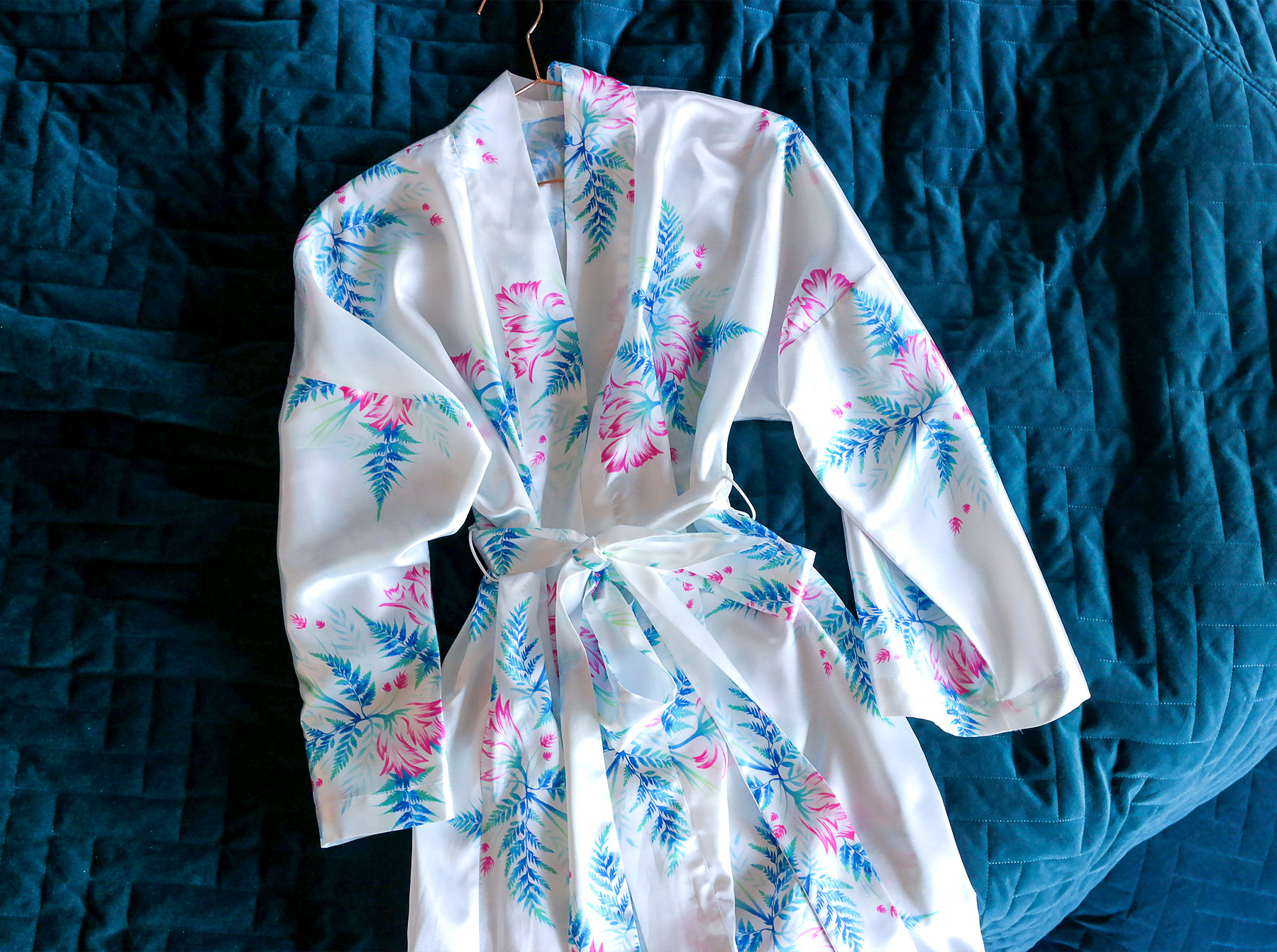White satin robe with floral print by Andrea Muller