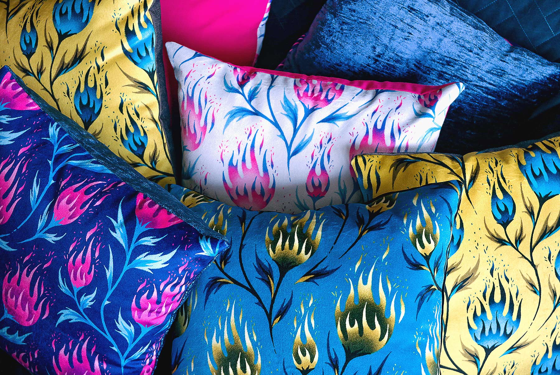 Fire flower floral pattern velvet cushions by Andrea Muller