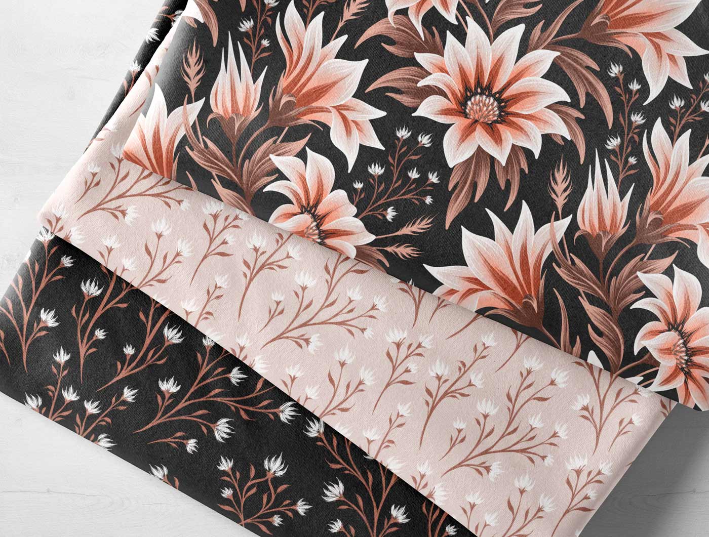 Three coordinating gazania floral fabrics in black and beige by Andrea Muller