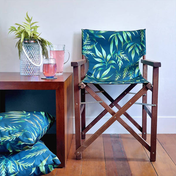 Tropical green leaf pattern deck chair by Andrea Muller