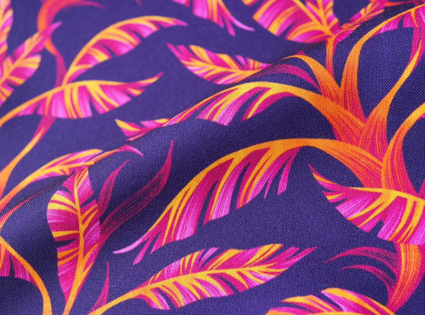 Tropical orange and purple leaf pattern fabric by Andrea Muller