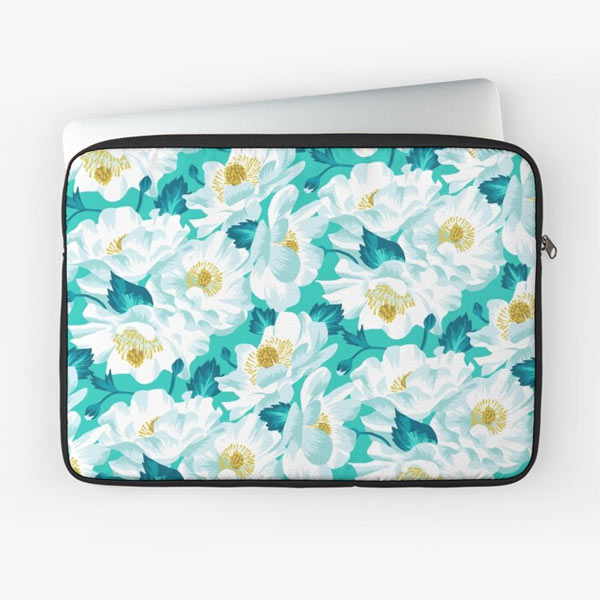Teal and white floral print Mount Cook Lily laptop sleeve by Andrea Muller