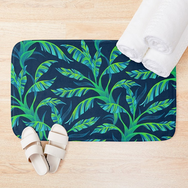 Tropical green banana leaf bath mat by Andrea Muller