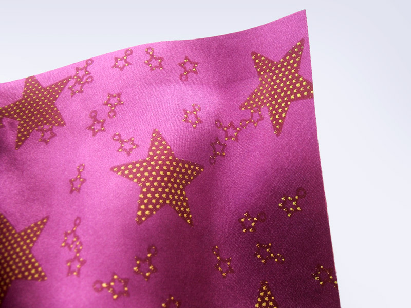 Purple satin fabric with spotted star screenprint
