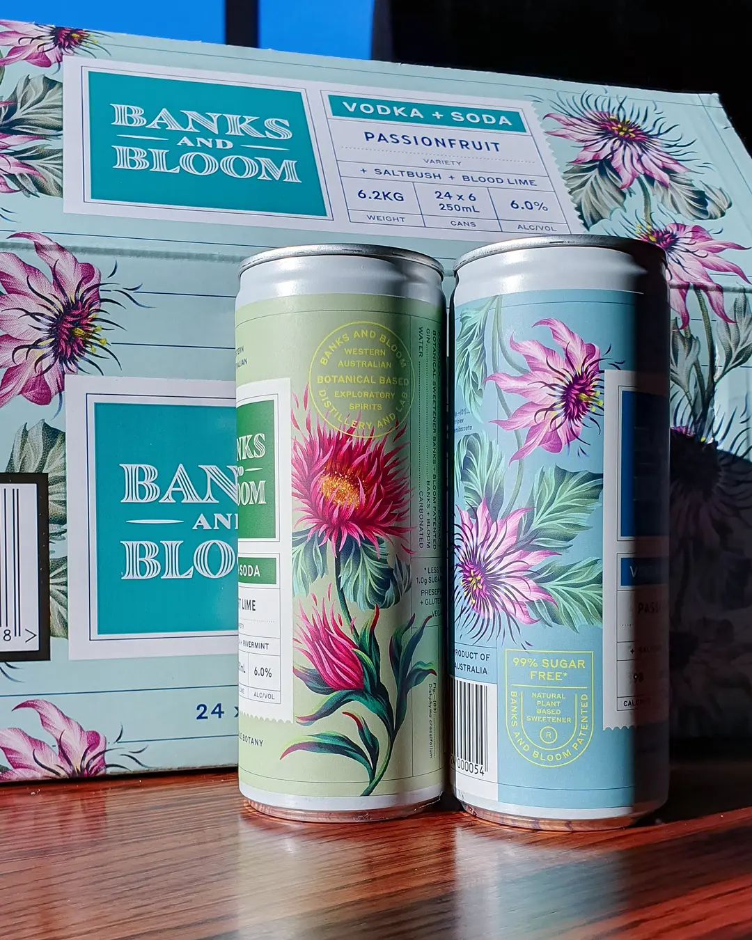 Gin and vodka RTD cans with floral illustation by Andrea Muller