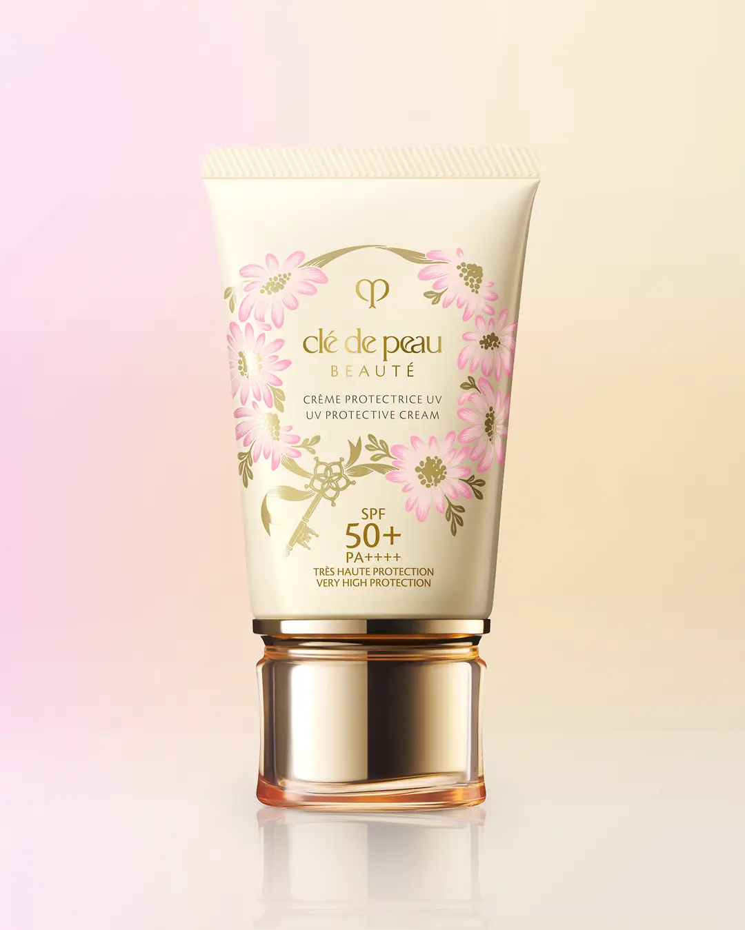 Clé de Peau Beauté UV Cream bottle design with pink daisy wreath by Andrea Muller