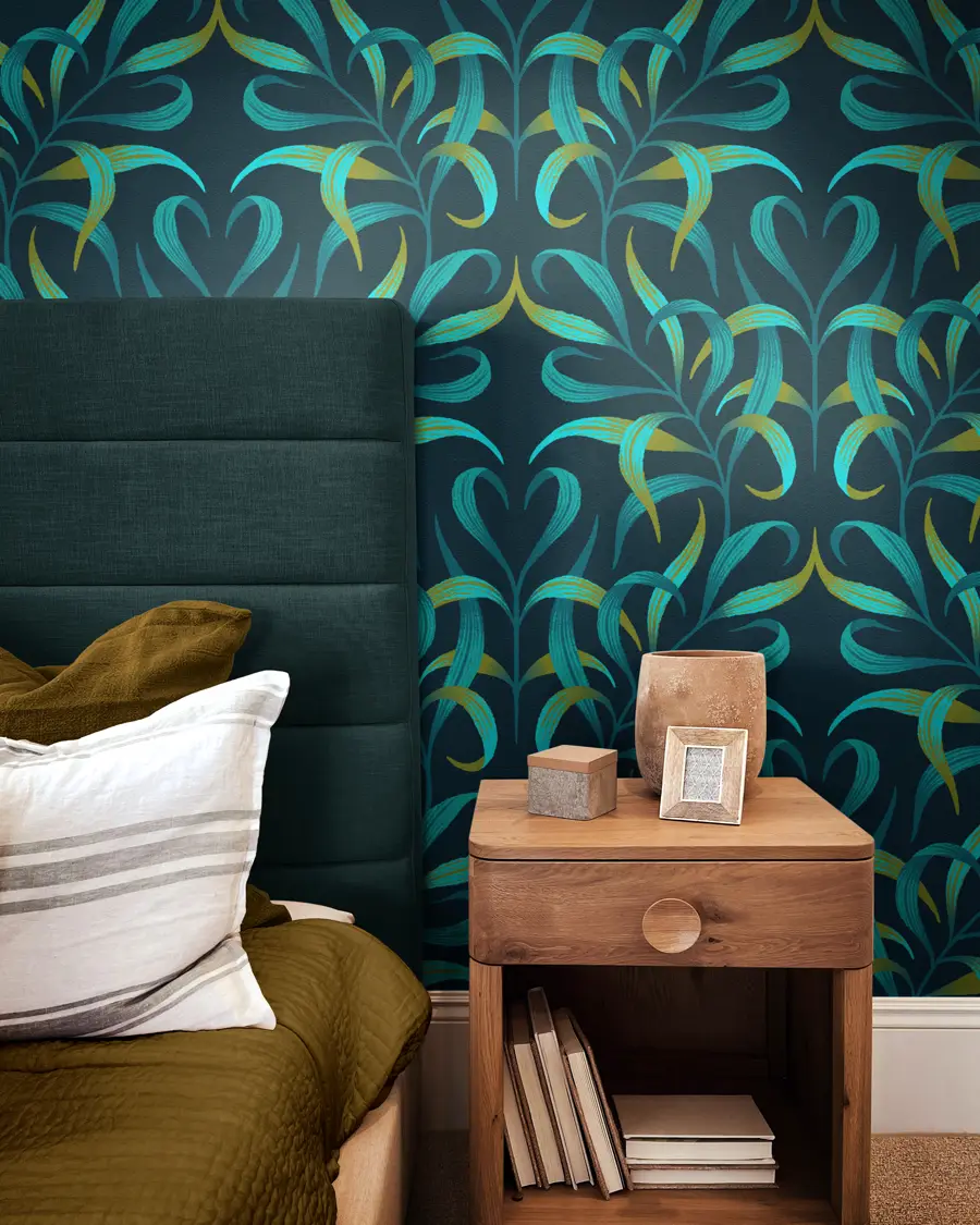 Curled green palm fronds intertwining symmetrical print wallpaper design by Andrea Muller