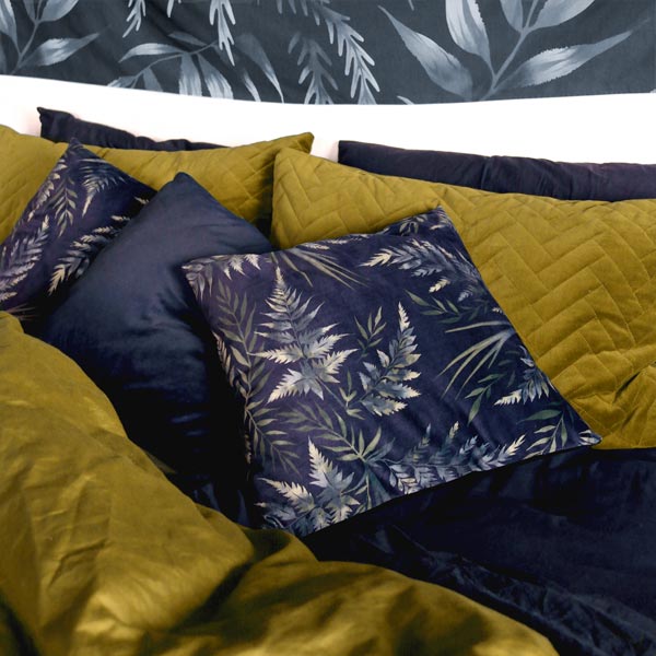 Black velvet watercolor fern leaf patterned cushions by Andrea Muller