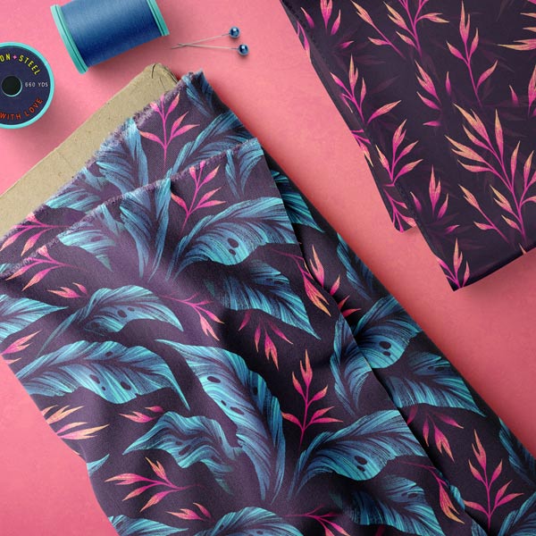Tropical blue leaf print fabric by Andrea Muller