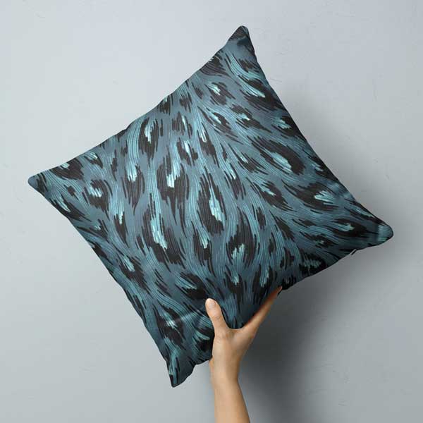 Grey and black leopard print throw cushion by Andrea Muller