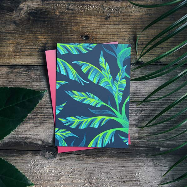 Tropical green banana leaf pattern greeting card by Andrea Muller