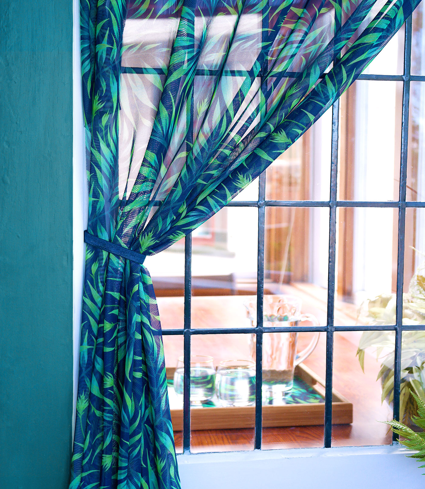 Waikiki Palm green leaf sheer curtain fabric by Andrea Muller