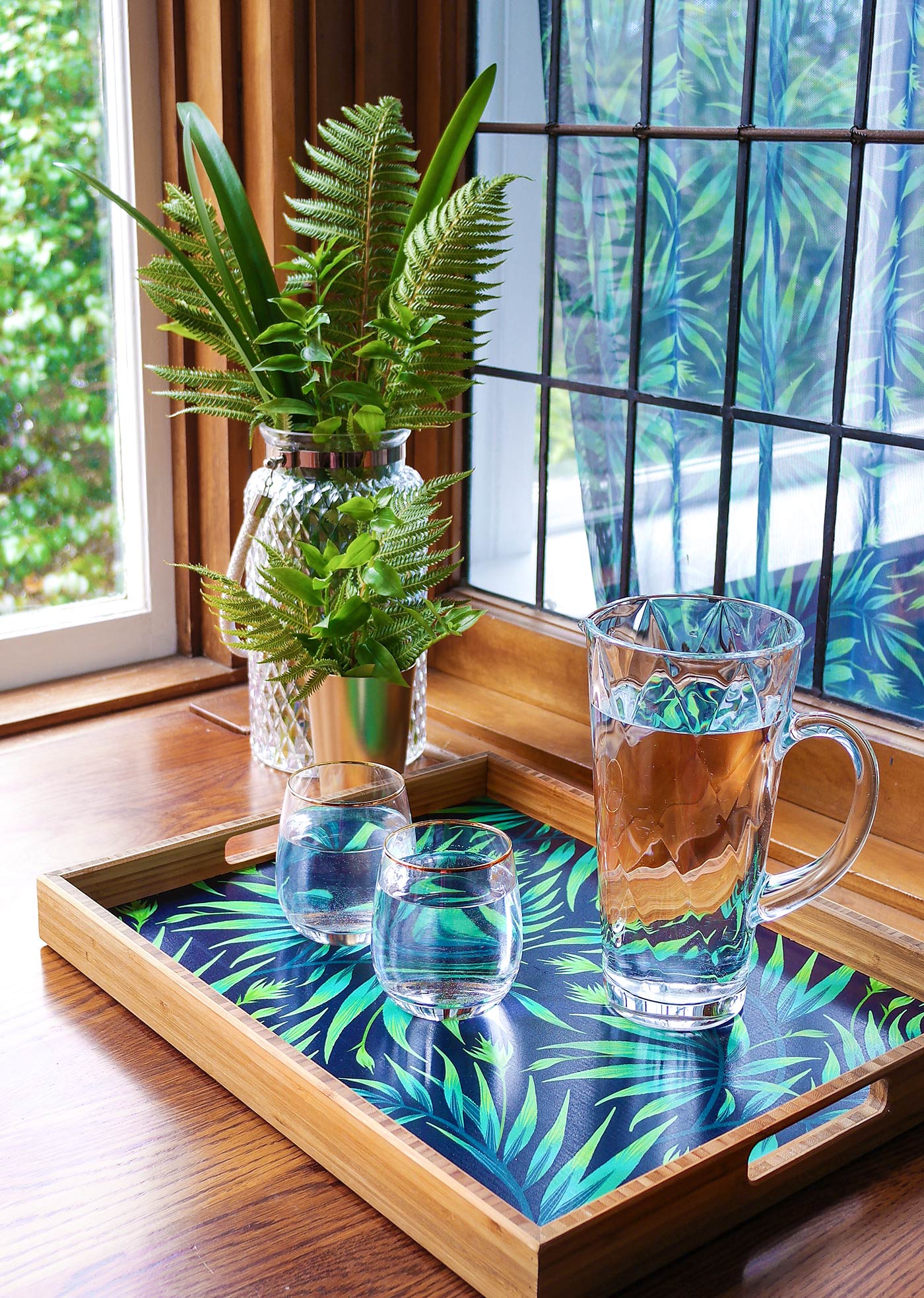 Tropical palm leaf pattern wooden serving tray by Andrea Muller