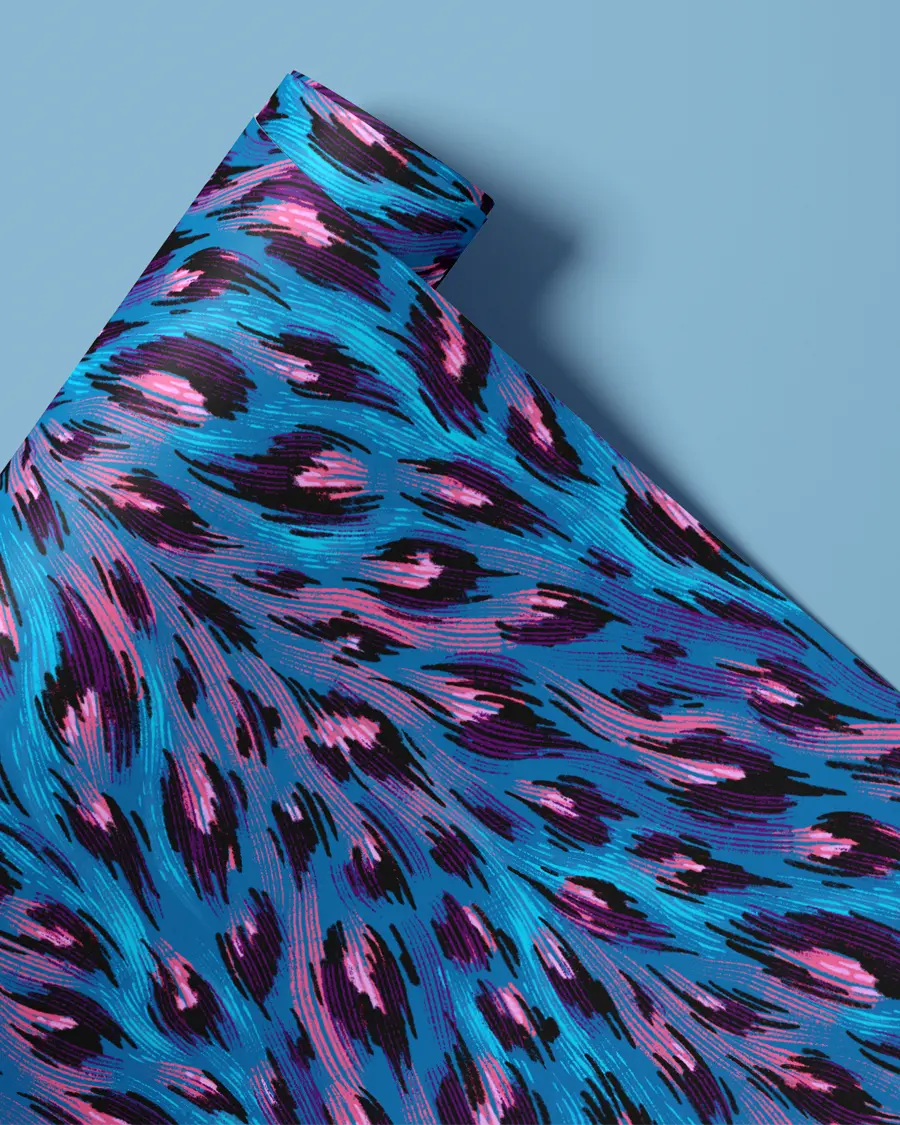 Bright blue and pink hand drawn leopard print wallpaper by Andrea Muller